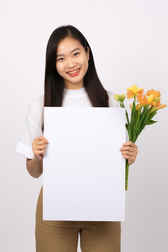 A asian florist woman portrait holding flower. AI generated Image by rawpixel.