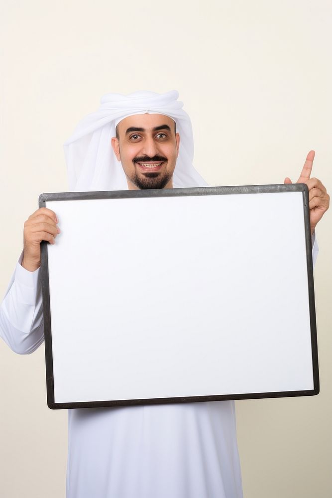 A arab teacher man portrait holding adult. AI generated Image by rawpixel.