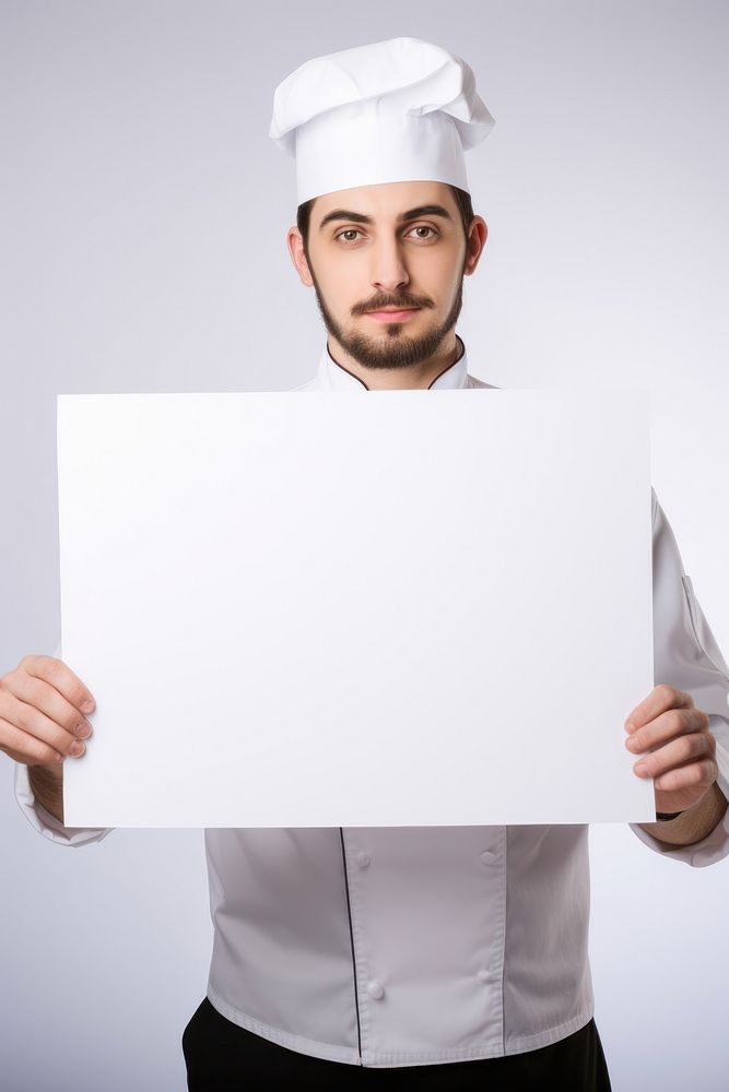 A chef in uniform man portrait holding adult. AI generated Image by rawpixel.
