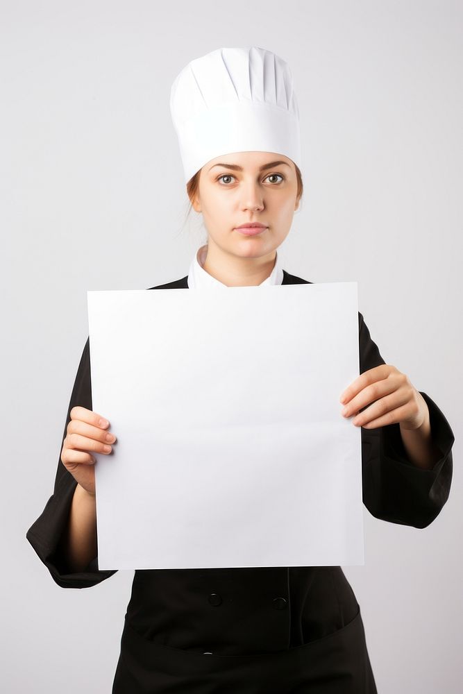 A chef in uniform woman portrait paper holding. AI generated Image by rawpixel.