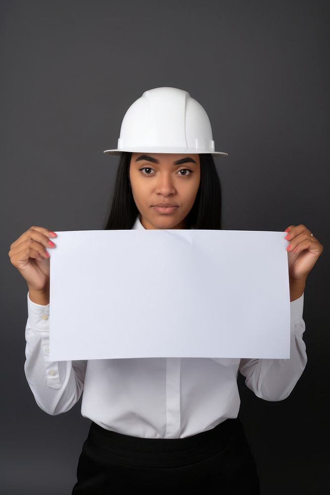 A engineer woman earing hat portrait holding hardhat. AI generated Image by rawpixel.