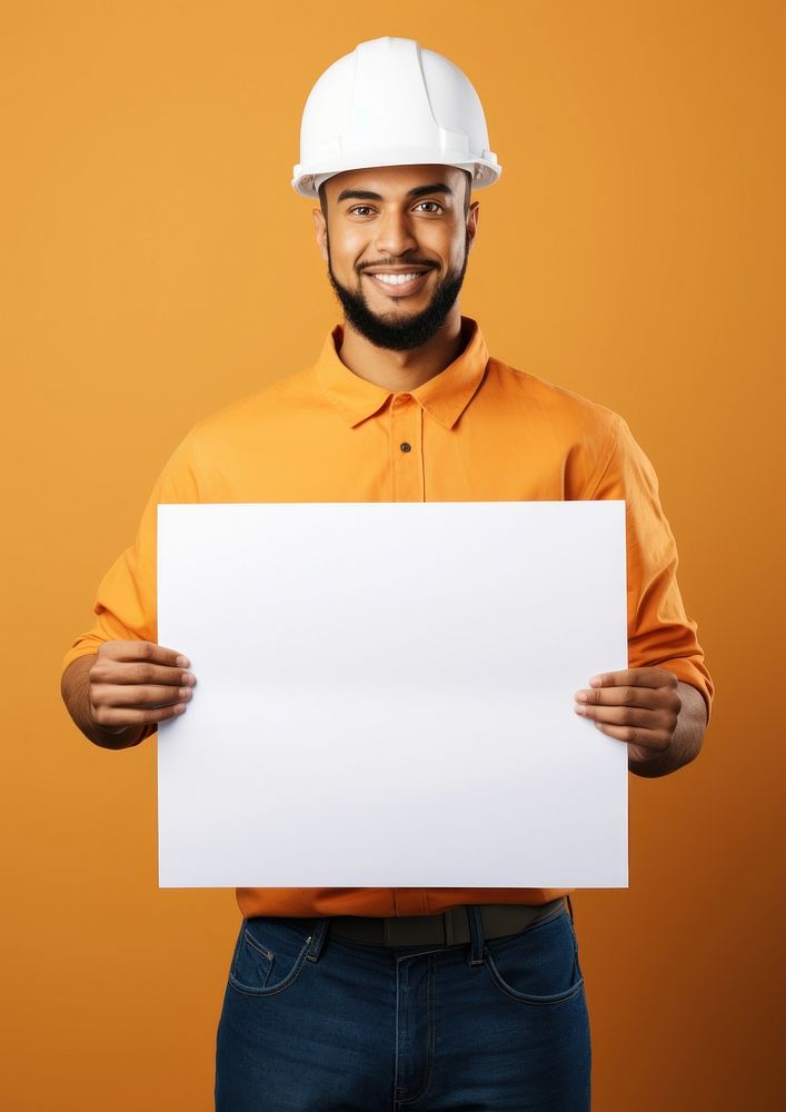 A engineer latin man portrait holding hardhat. AI generated Image by rawpixel.
