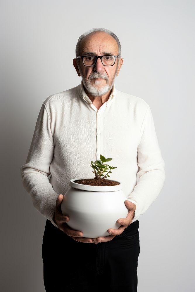 A gardener senior man portrait plant glasses. AI generated Image by rawpixel.