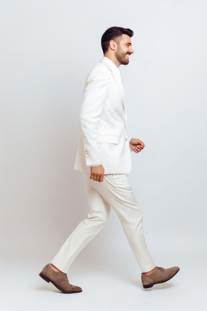 A happy groom walking tuxedo blazer. AI generated Image by rawpixel.