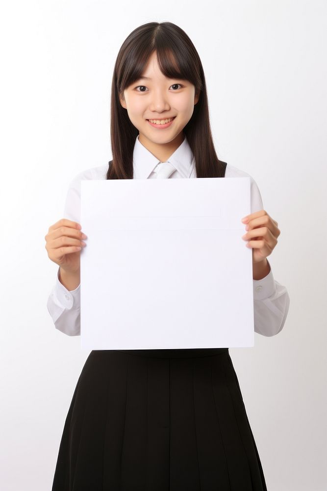 A japan student uniform girl portrait holding paper. AI generated Image by rawpixel.