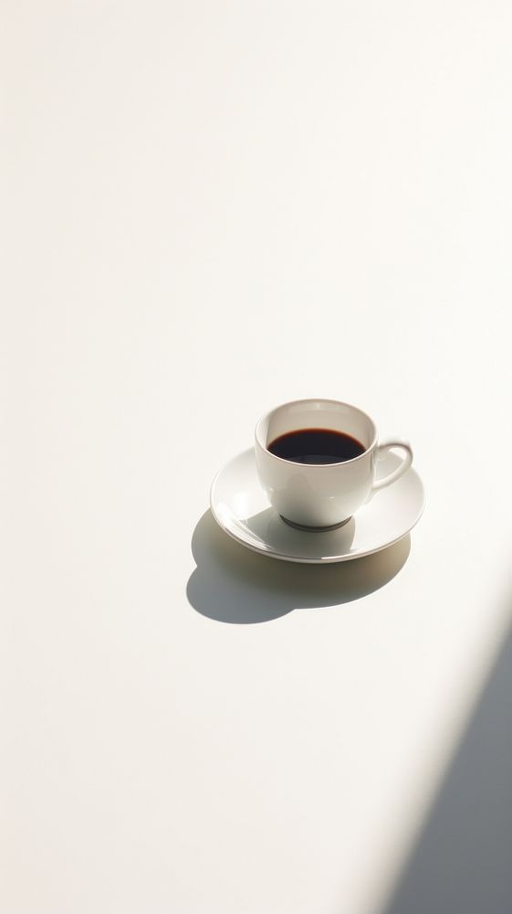 Tea saucer shadow coffee. AI generated Image by rawpixel.