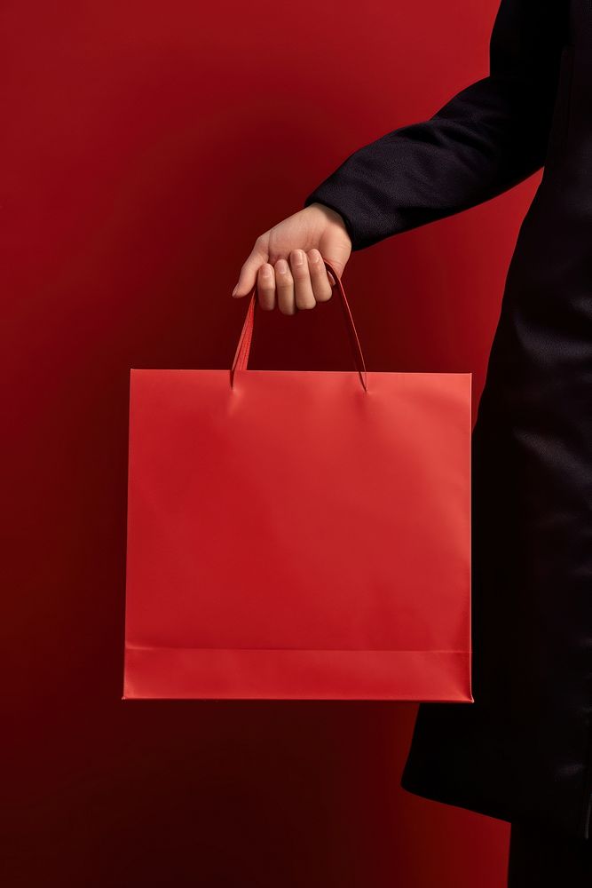 Paper bag handbag adult red. AI generated Image by rawpixel.