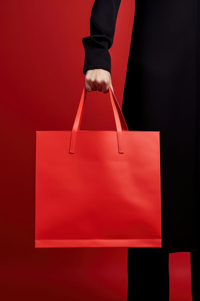 Paper bag handbag red accessories. AI generated Image by rawpixel.