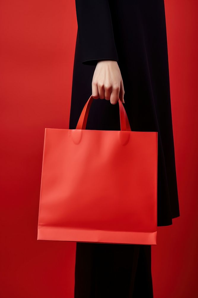Paper bag handbag red accessories. AI generated Image by rawpixel.