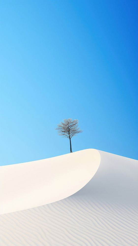 A white sand dune with a small tree sky outdoors nature. AI generated Image by rawpixel.