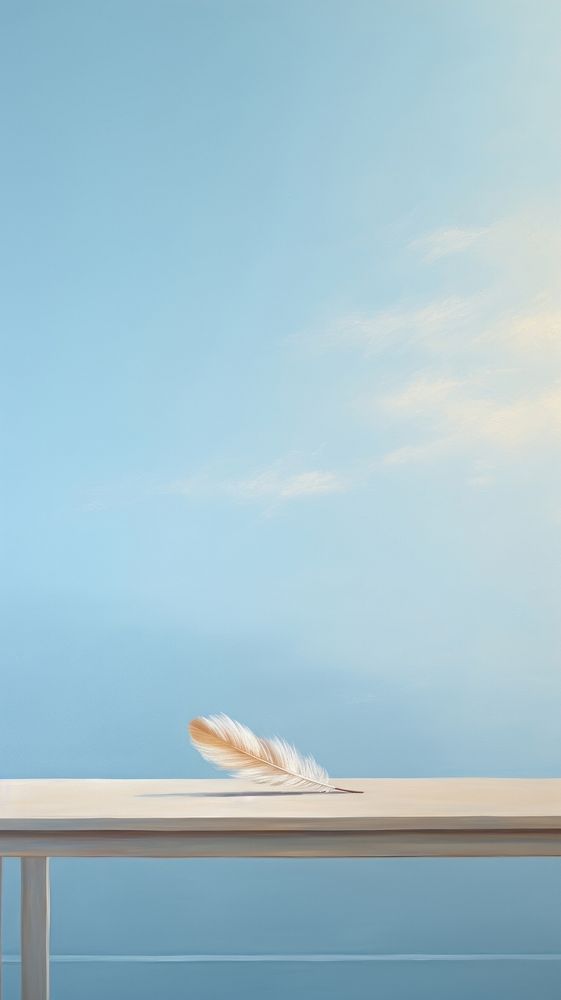 A feather on the table next to the window with sky background architecture horizon nature. AI generated Image by rawpixel.