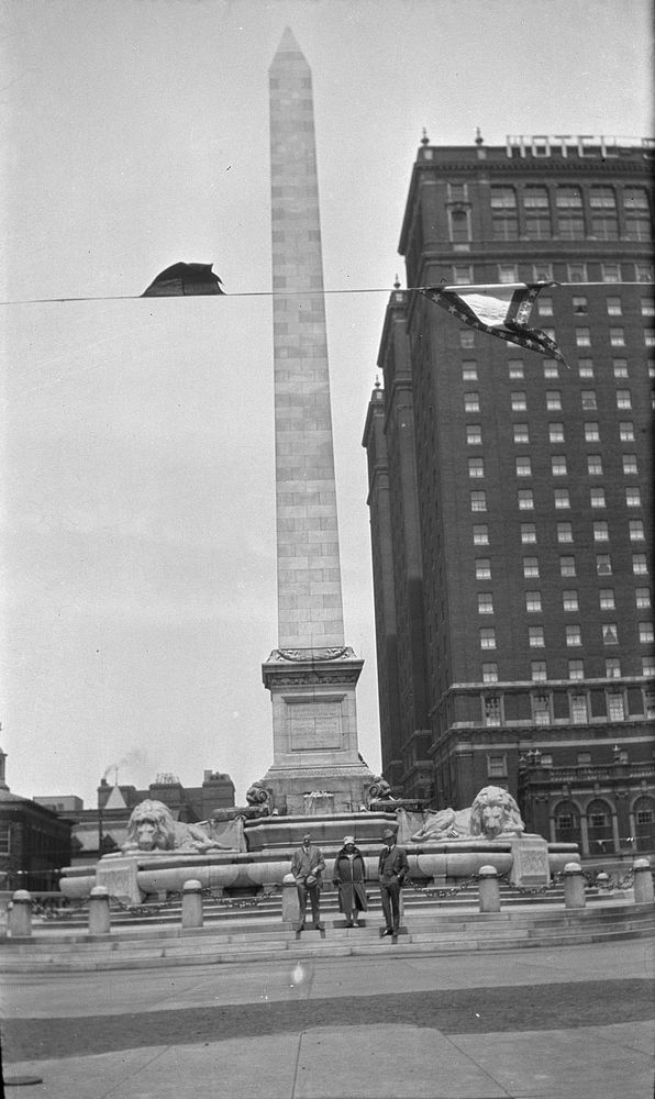 [Group standing in front of obelisk]. (1920s to 1930s) by Roland Searle.