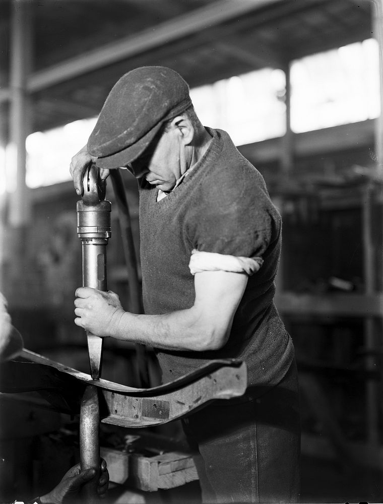 Man rivetting, General Motors assembly plant, Petone (circa 1936) by Ken Niven and Gordon H Burt Ltd.