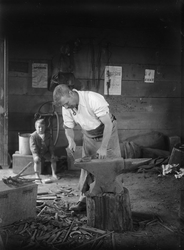 Blacksmith at His Forge (circa 1910) by Fred Brockett.