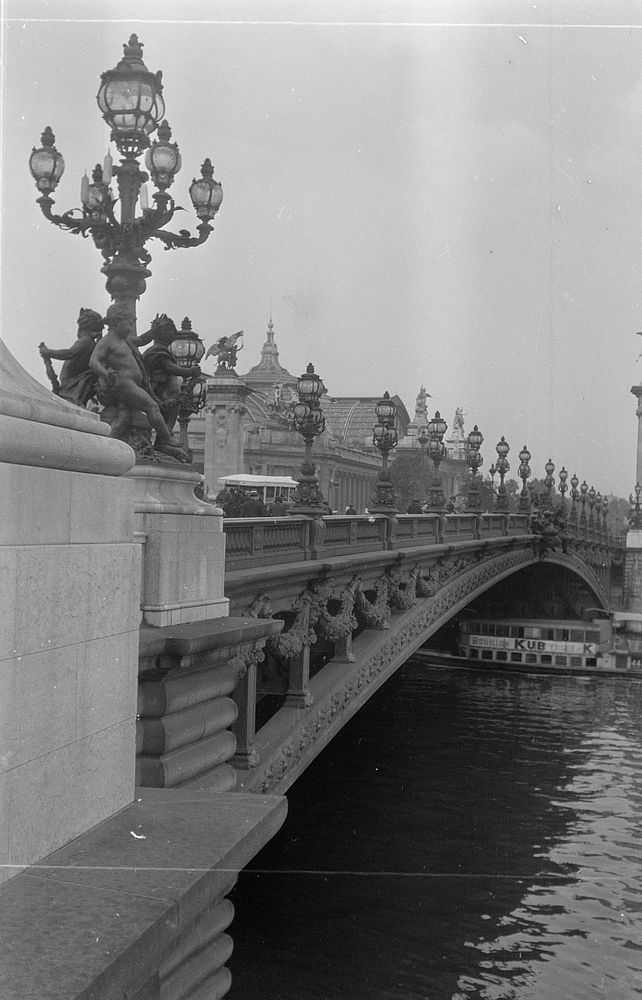 Bridge over Paris river waters by Eric Lee Johnson.