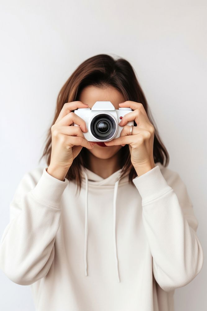 Woman taking photo portrait camera adult. AI generated Image by rawpixel.