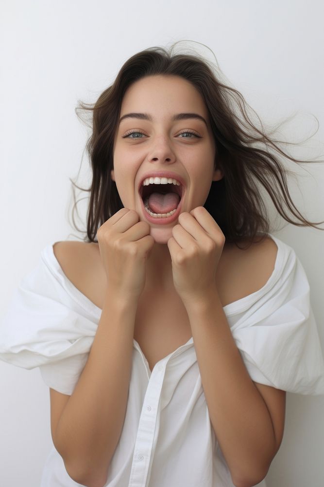 Young girl shouting surprise portrait. AI generated Image by rawpixel.