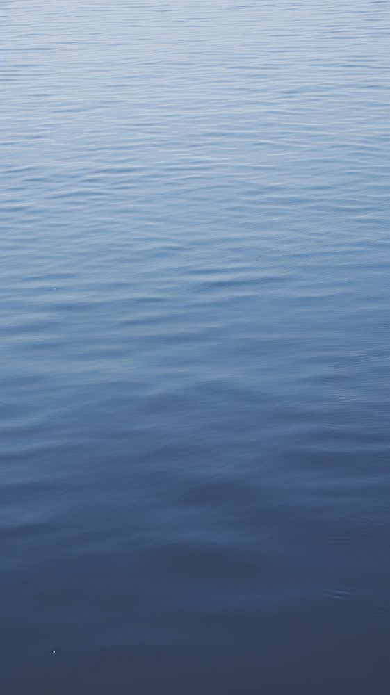 Blue water surface reflection outdoors nature. AI generated Image by rawpixel.