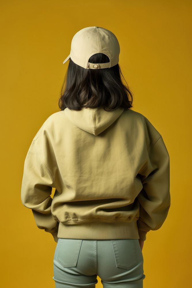 Asian teen wear a cap sweatshirt fashion adult. AI generated Image by rawpixel.