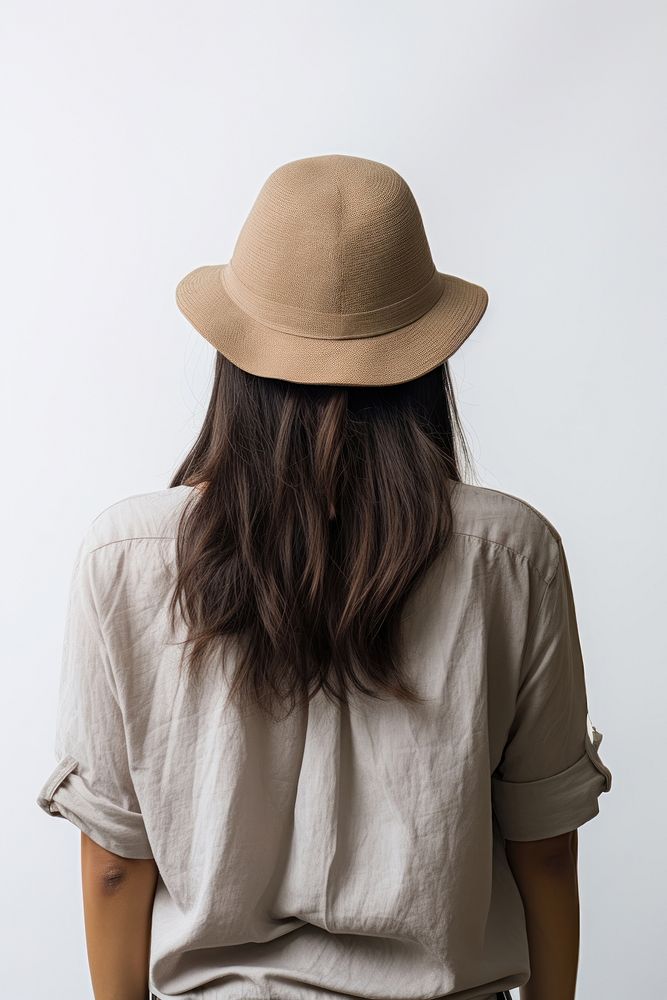 Asian teen wear a hat fashion adult back. AI generated Image by rawpixel.