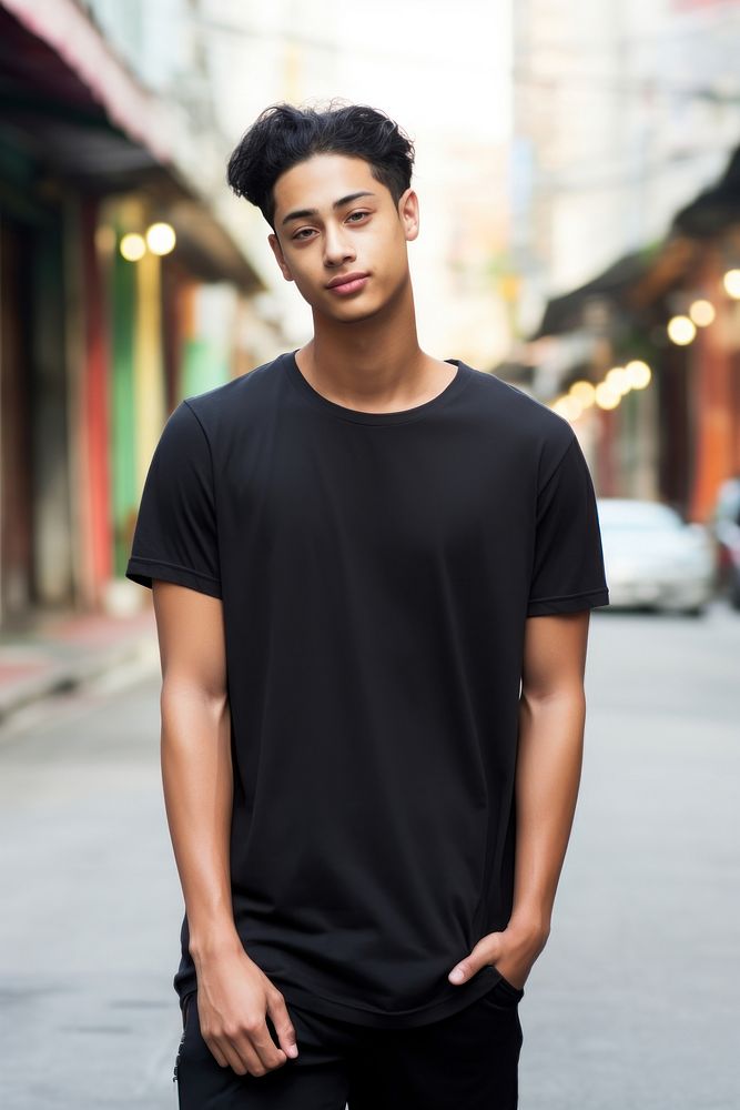 Thai teenager wearing black t-shirt walking photography portrait sleeve. AI generated Image by rawpixel.