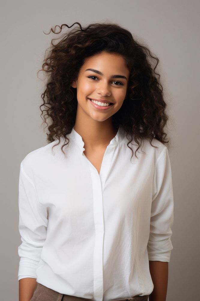 Woman in the outfit white shirt in natural posed photography portrait blouse. AI generated Image by rawpixel.