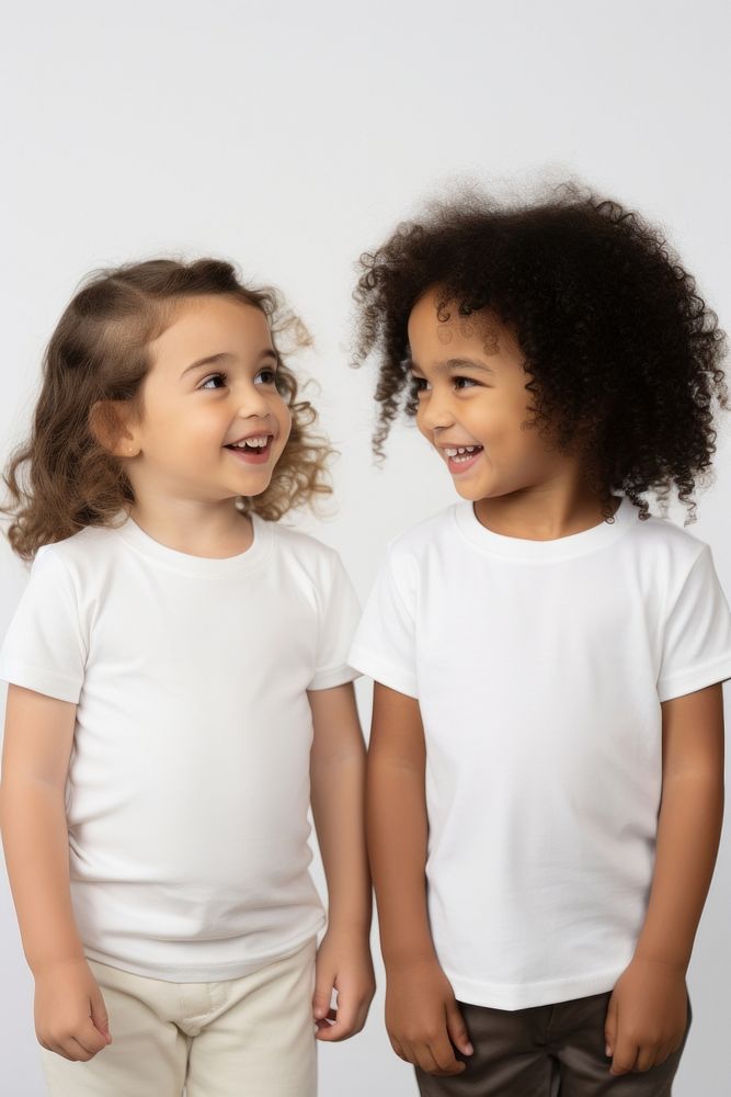 Children wearing white t-shirt talking together photography portrait fashion. AI generated Image by rawpixel.