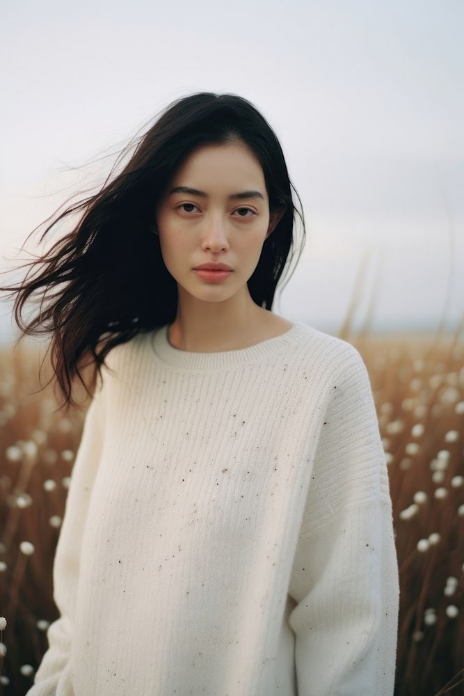 Vietnamese woman sweater portrait outdoors. AI generated Image by rawpixel.
