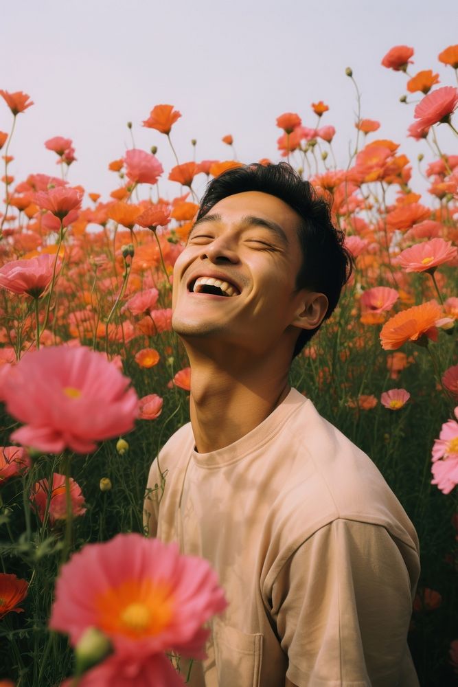 Happy East Asian man flower portrait outdoors. AI generated Image by rawpixel.