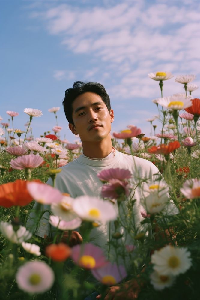 Happy East Asian man flower outdoors portrait. AI generated Image by rawpixel.