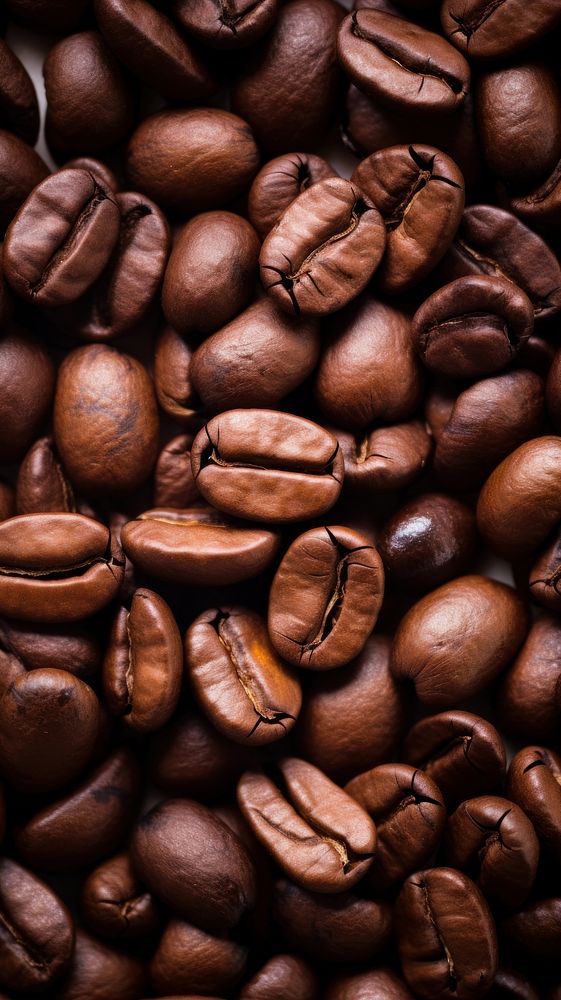 Coffee bean texture coffee beans backgrounds abundance. AI generated Image by rawpixel.