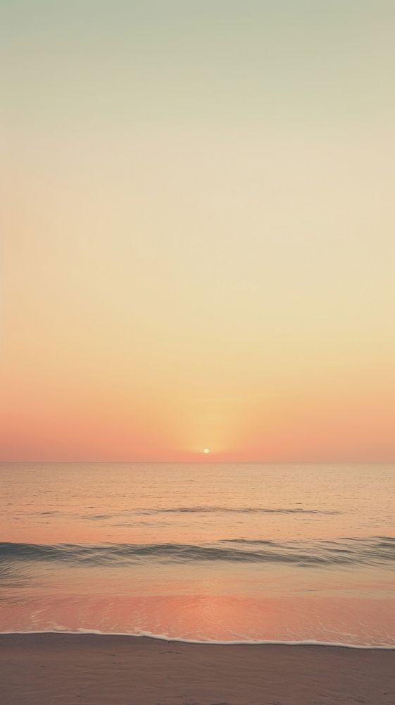 Sunset on the beach outdoors horizon nature. AI generated Image by rawpixel.