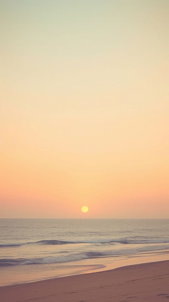 Sunset on the beach outdoors horizon nature. AI generated Image by rawpixel.