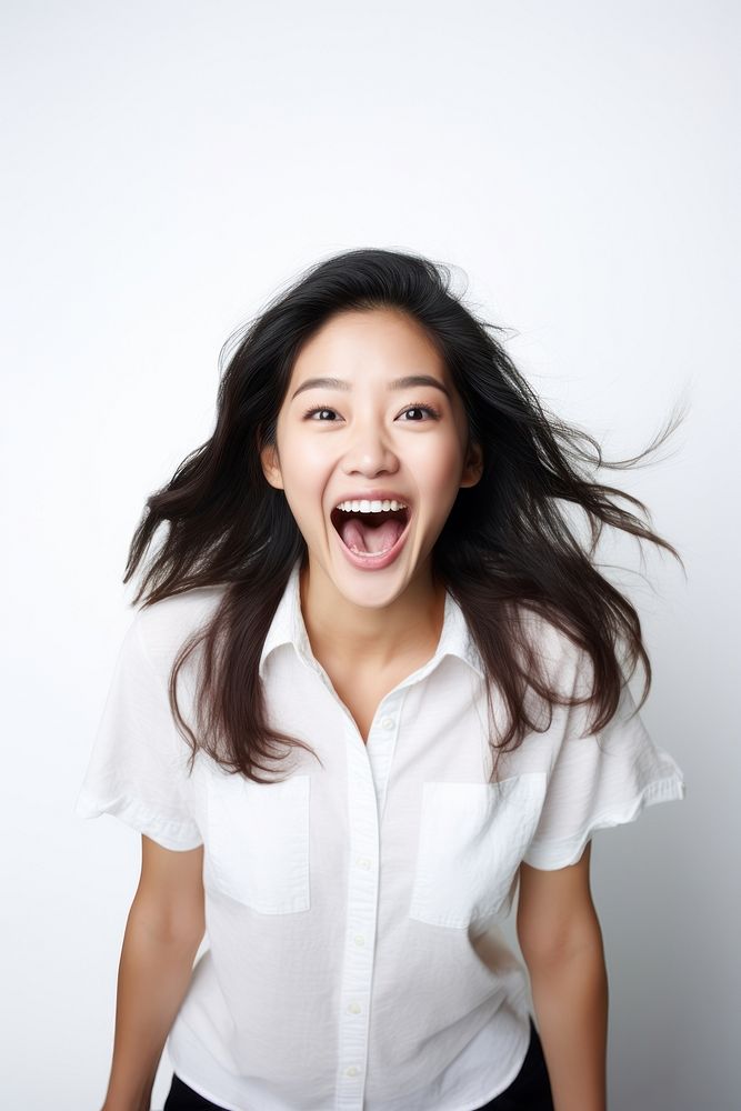 Asian woman surprise laughing blouse. AI generated Image by rawpixel.
