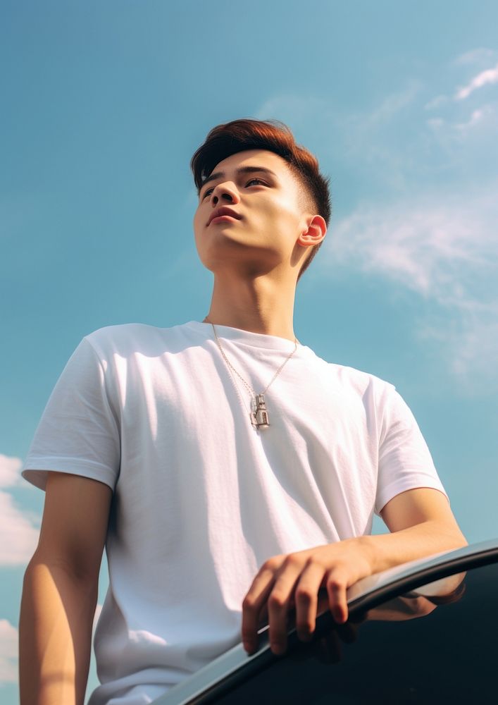 Thai young man blue sky contemplation. AI generated Image by rawpixel.