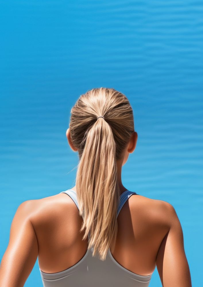 The back of a person wearing a swimming costume ponytail adult exercising. AI generated Image by rawpixel.