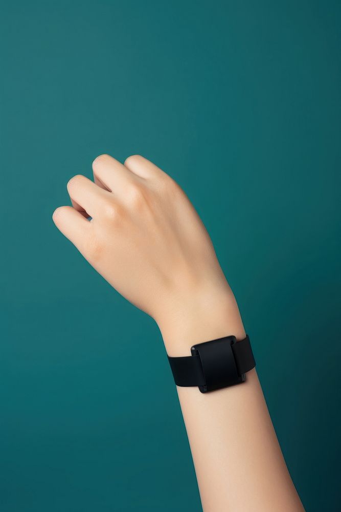 Smartwatch wearing on the wrist hand wristwatch adult. AI generated Image by rawpixel.