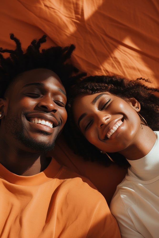 Black couple lying on the floor smiling adult happy. AI generated Image by rawpixel.