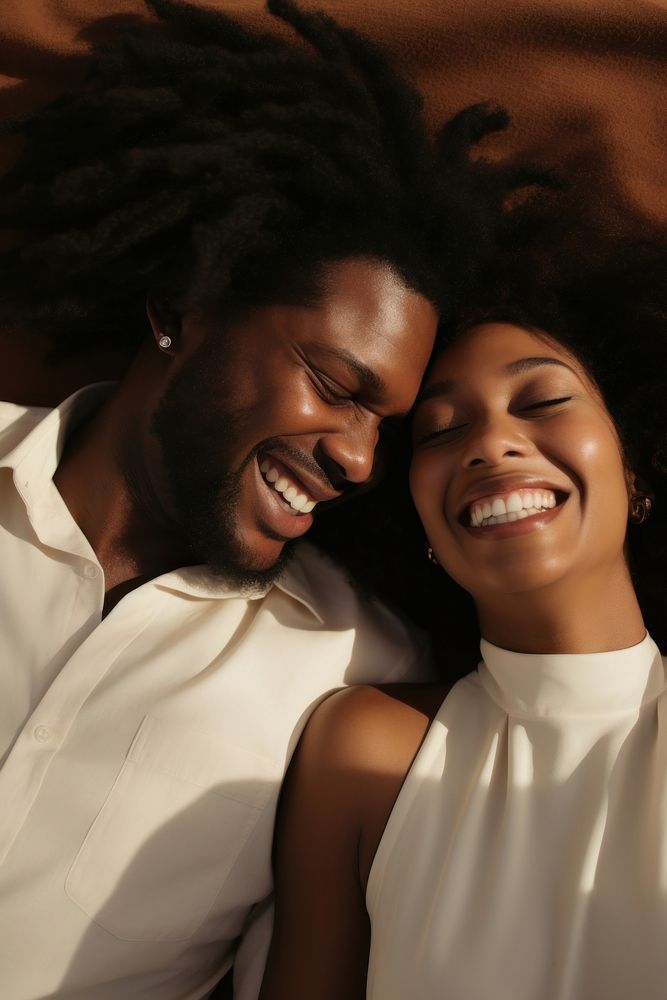 Black couple lying on the floor laughing portrait smiling. AI generated Image by rawpixel.
