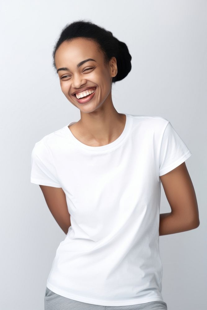 Woman laughing t-shirt smiling. AI generated Image by rawpixel.