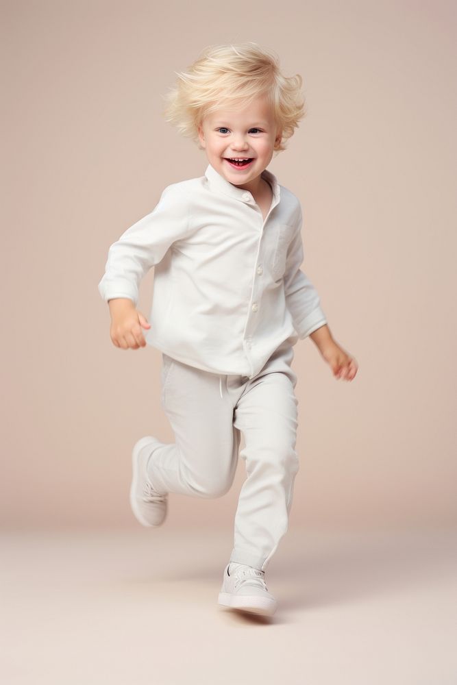 Little boy portrait footwear blonde. AI generated Image by rawpixel.