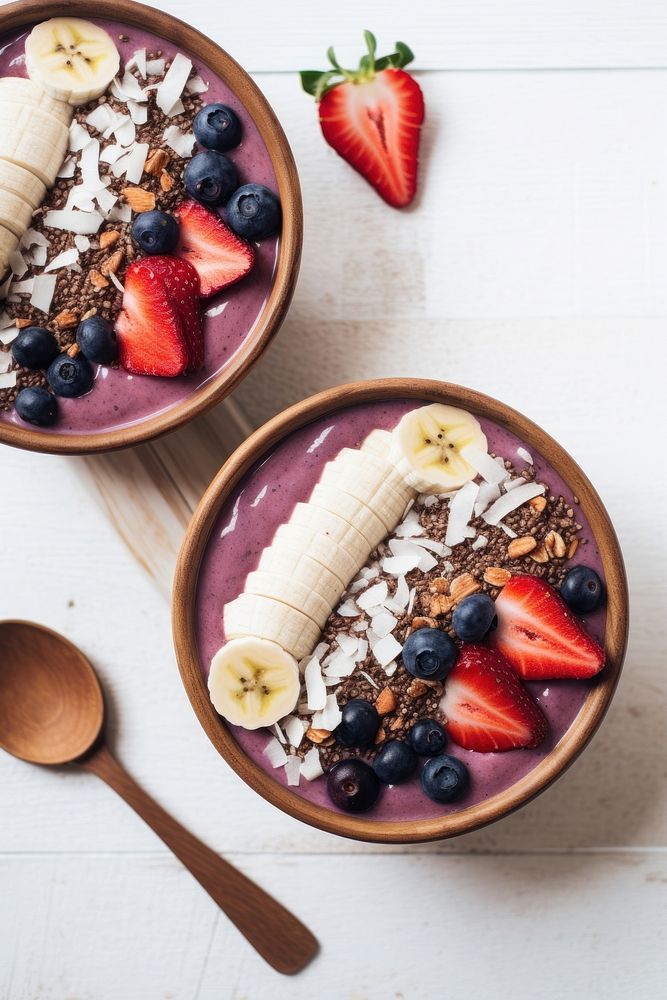 Acai bowl granola fruit spoon. AI generated Image by rawpixel.
