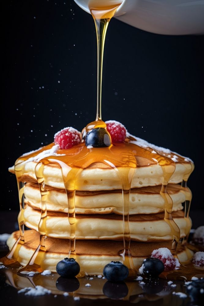 Dropping icing pancake food dessert. AI generated Image by rawpixel.