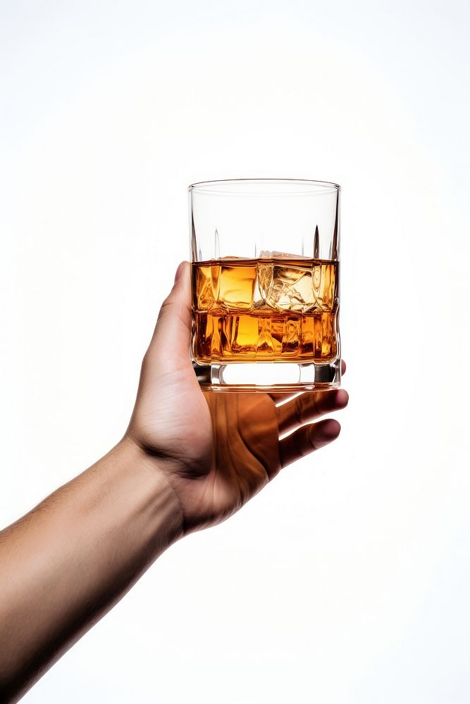 A whiskey glass holding whisky drink. AI generated Image by rawpixel.