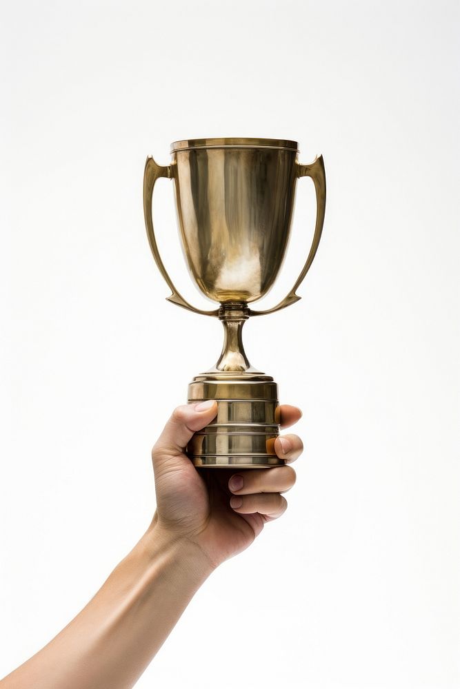 A hand holding a trophy white background achievement midsection. AI generated Image by rawpixel.