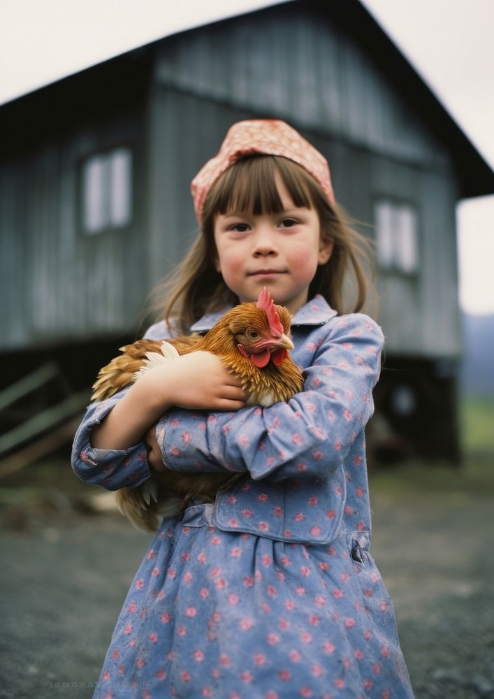 A girl carry a chicken photography portrait outdoors. AI generated Image by rawpixel.
