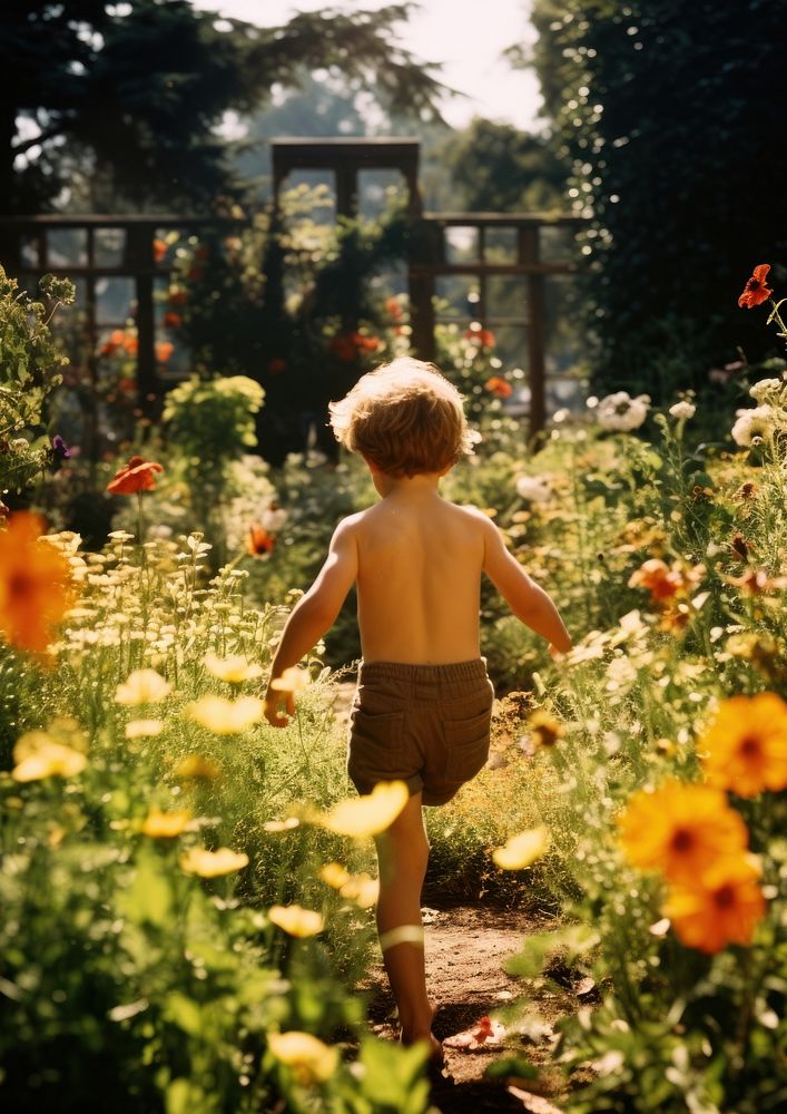 A kid running in the flower garden photography outdoors backyard. AI generated Image by rawpixel.