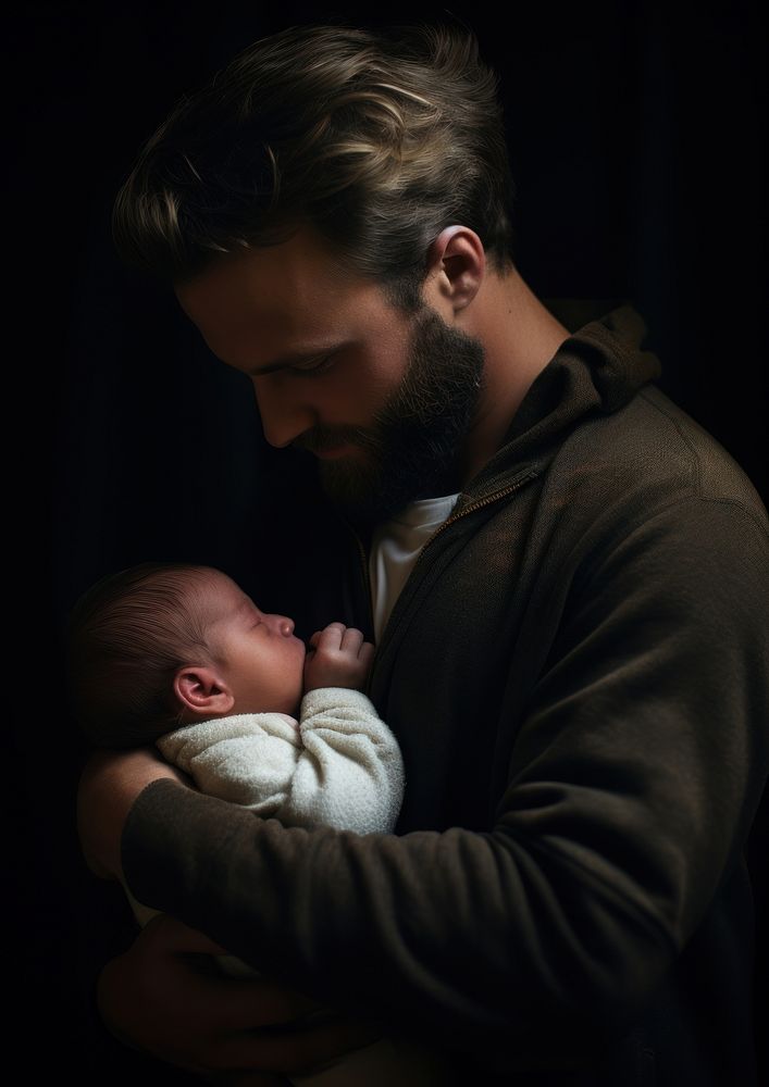 A father holding a newborn baby with joy photography portrait adult. AI generated Image by rawpixel.