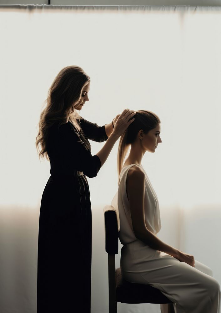 A woman doing hair salon for another woman adult togetherness silhouette. AI generated Image by rawpixel.