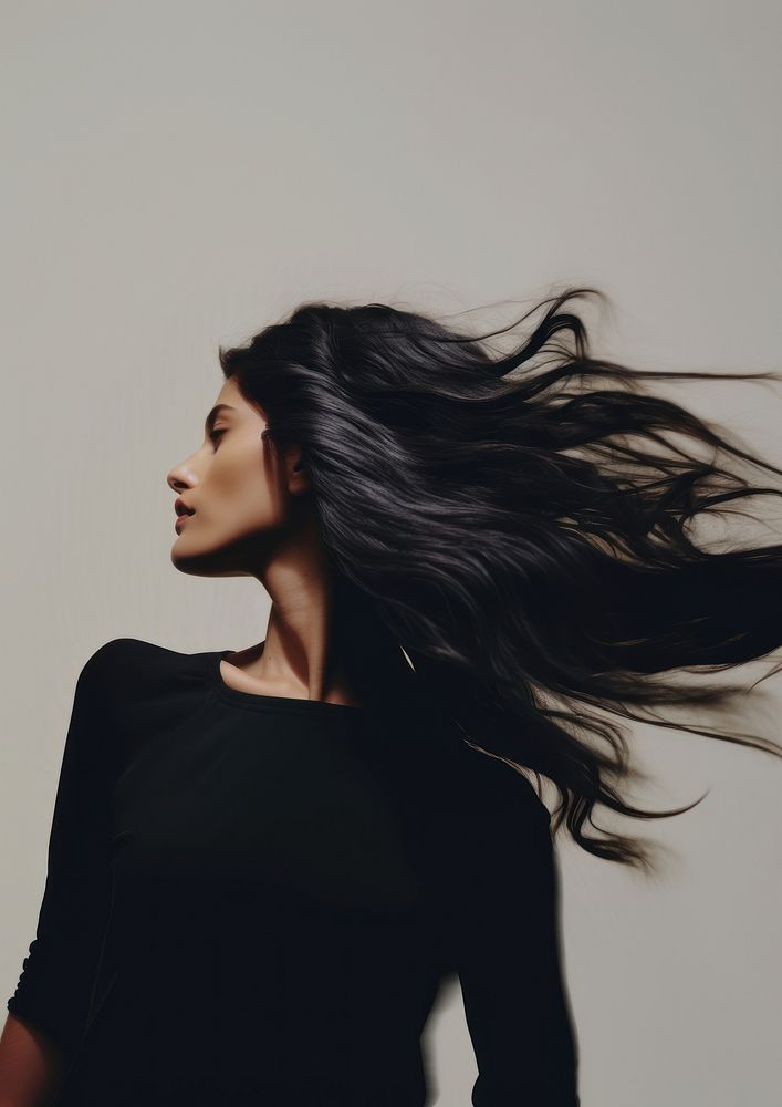 A woman doing her hair photography portrait motion. AI generated Image by rawpixel.